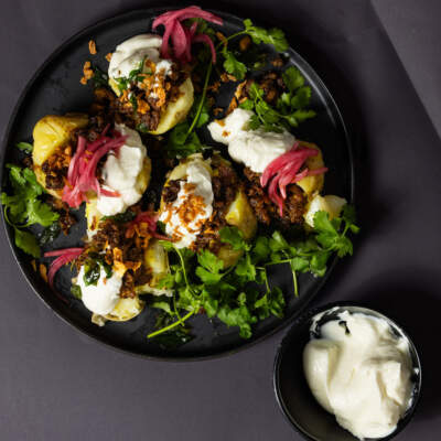 Mince curry-stuffed jacket potatoes